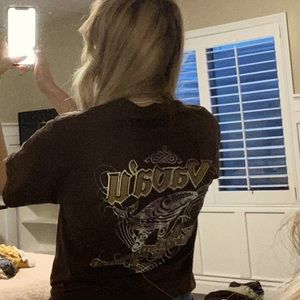 Brown graphic T with a pattern on the front and back.